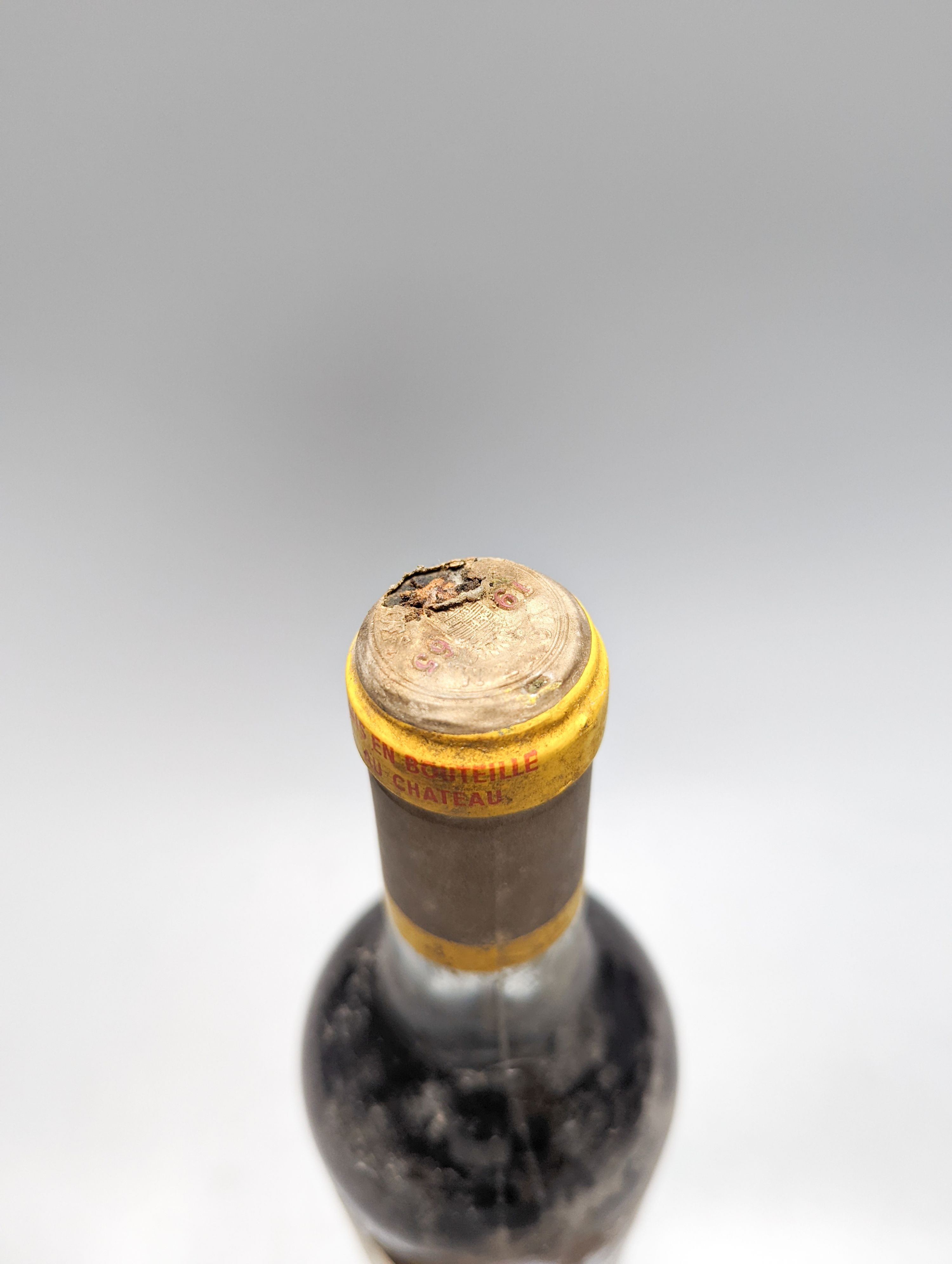 Two bottles of Chateau D'Yquem Sauternes 1967-1965, and a 375ml bottle